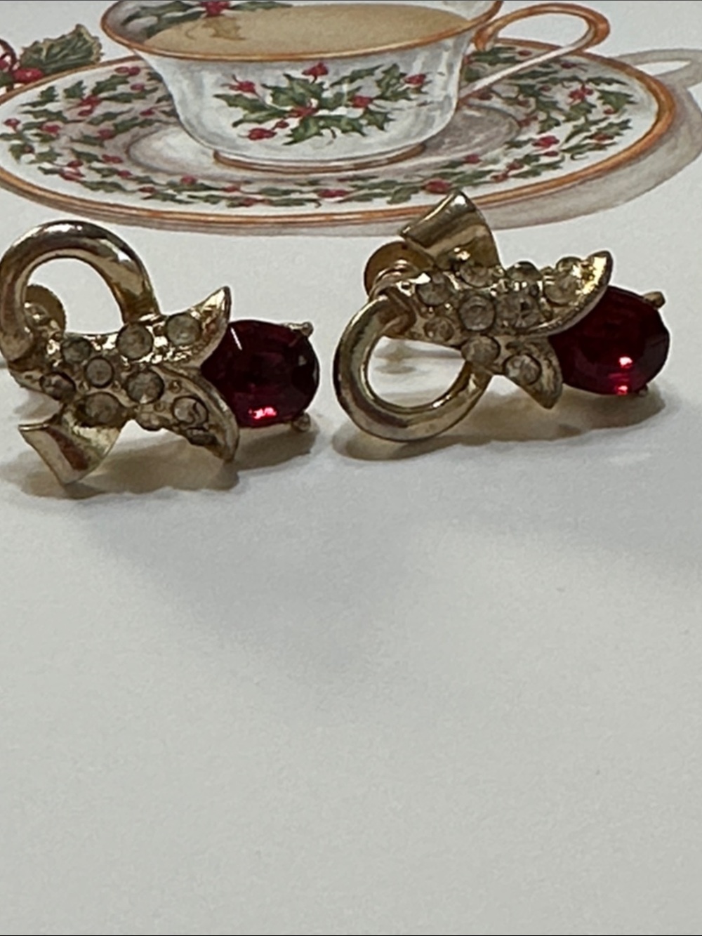 Gold-Tone Flower w/clear crystals screw back Earrings w/ Red Rhinestone Accent